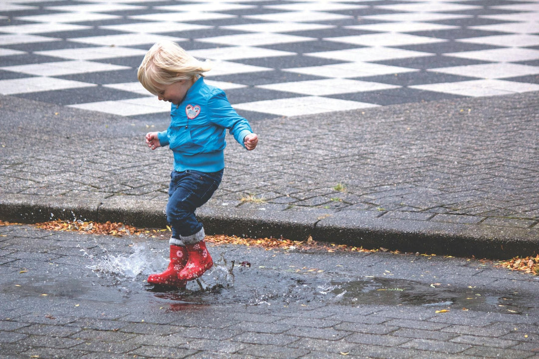 Is It Safe to Let Kids Play in the Rain? Benefits, Risks, and Safety Tips