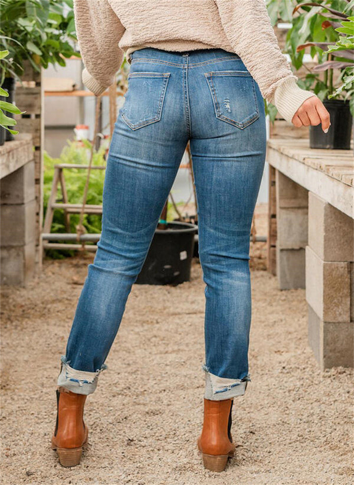 Slim Fit And Torn Blue Jeans For Women