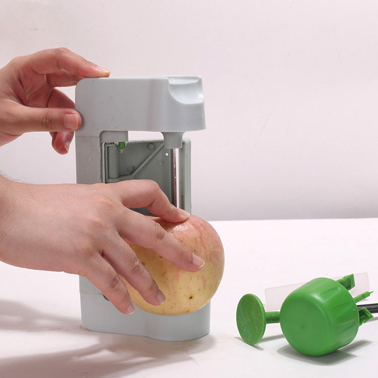 Hand rotating fruit and vegetable slicer