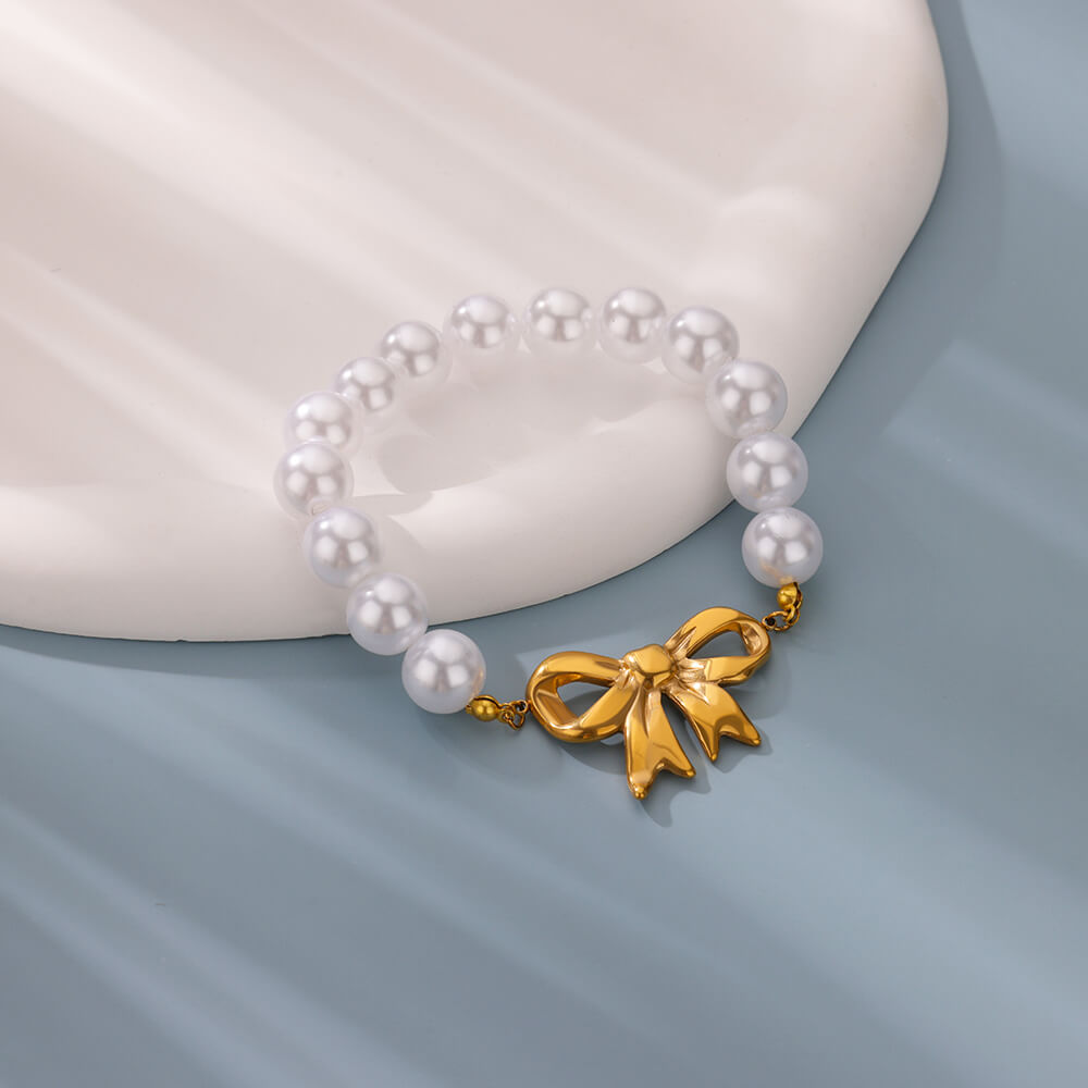 Gold Bowknot Bracelet with Imitation Pearls