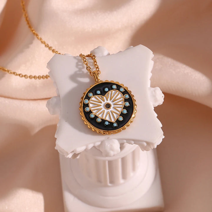 Double-Sided Black & White Enamel Heart Sunburst Necklace